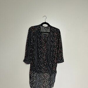 Eden & Olivia black with little flowers short front long back shirt size S